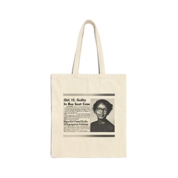 Tote bag with a newspaper clipping about a bus seat case.