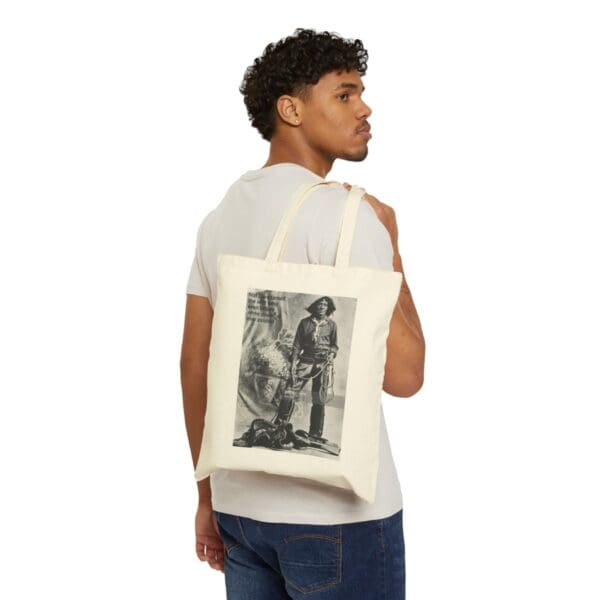 Man wearing a tote bag with a cowboy image.