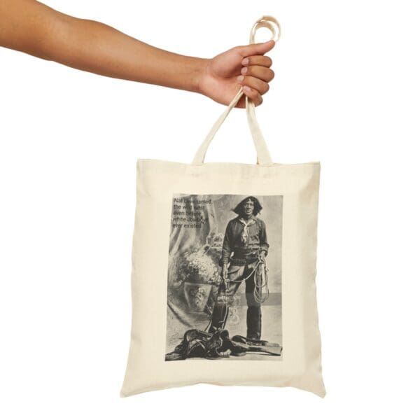 A white tote bag with a cowboy image.