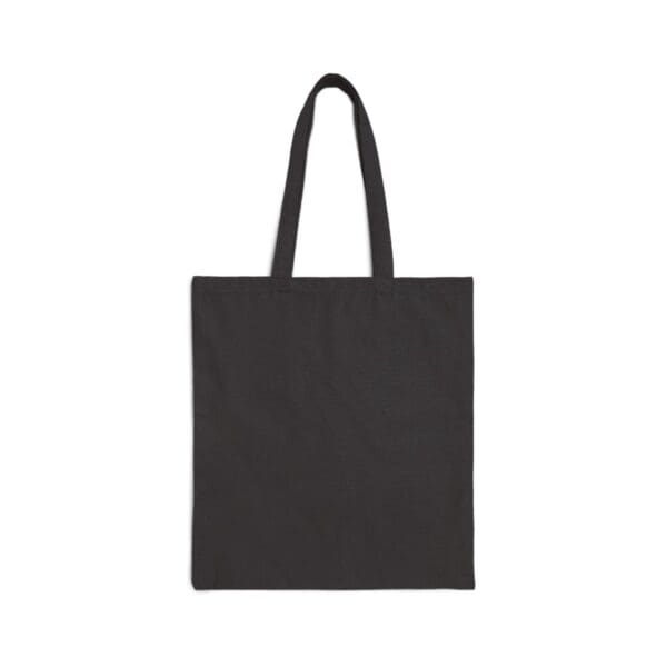 Black canvas tote bag on white background.