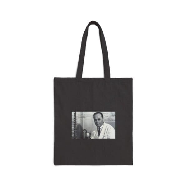 Black tote bag with a photo of a man.