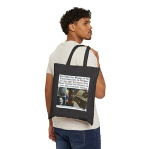 Man carrying a black tote bag with Daniel Hale Williams portrait.