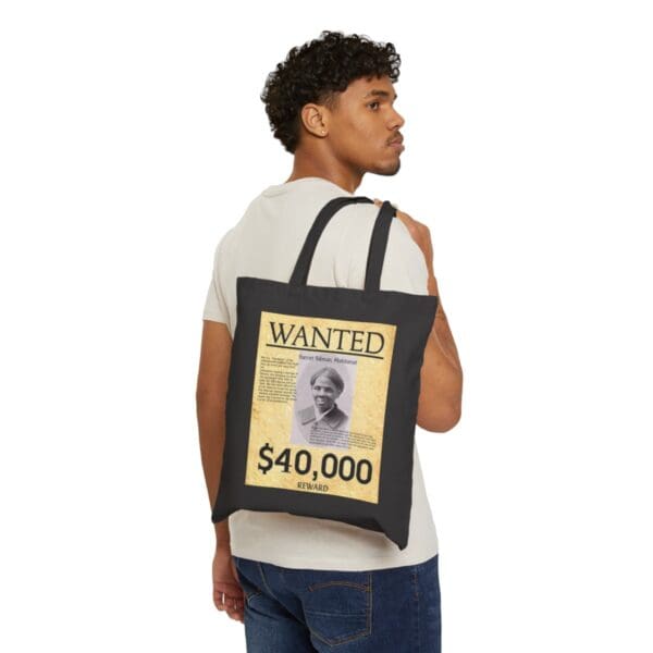 Black tote bag with Harriet Tubman wanted poster.