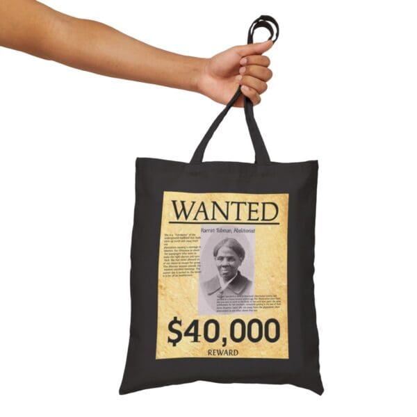 Black tote bag with Harriet Tubman wanted poster.