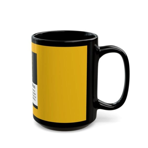 Black mug with yellow design.