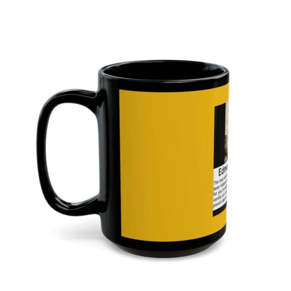 Black coffee mug with yellow design.