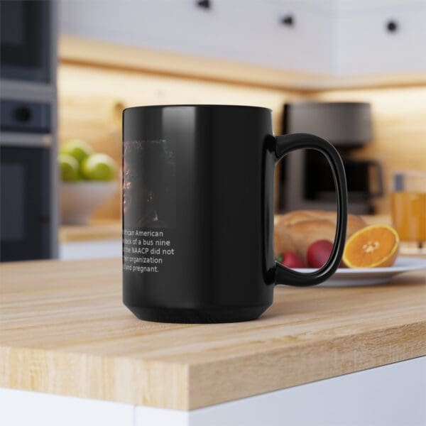 Black mug with quote about Rosa Parks.