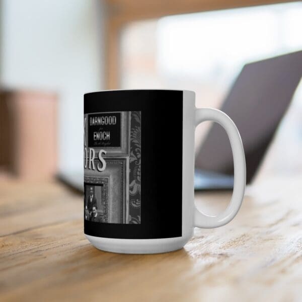 White mug with black and white design.