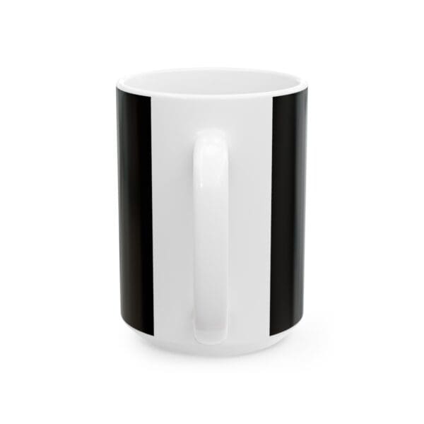 White coffee mug with black stripes.