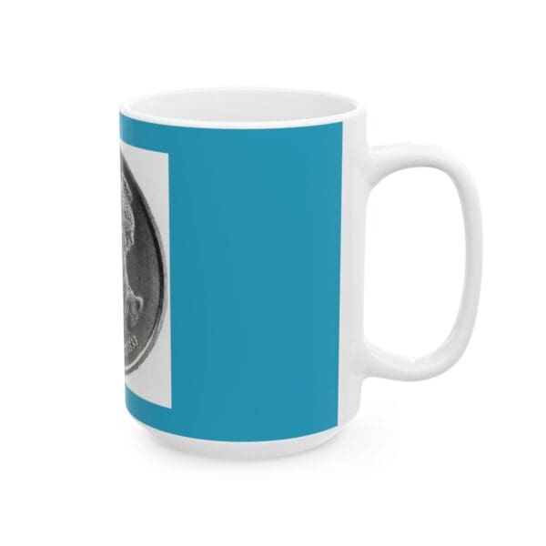 White mug with a blue coin design.