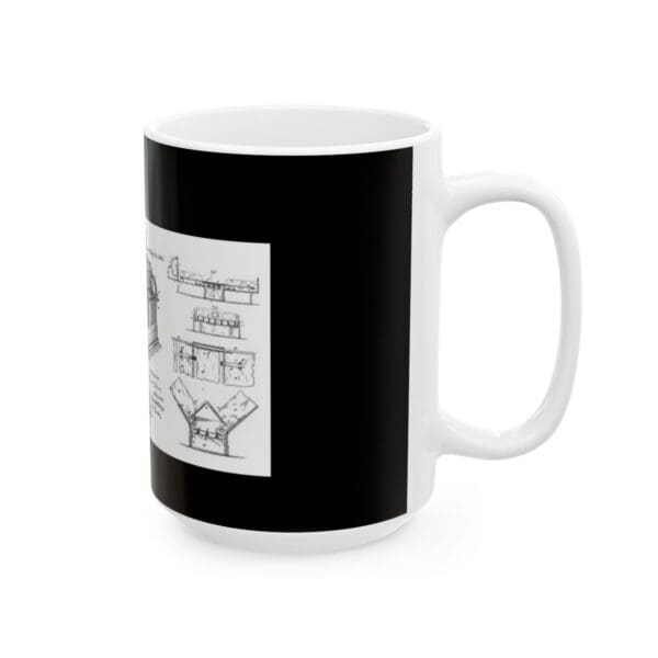 White mug with black and white diagrams.