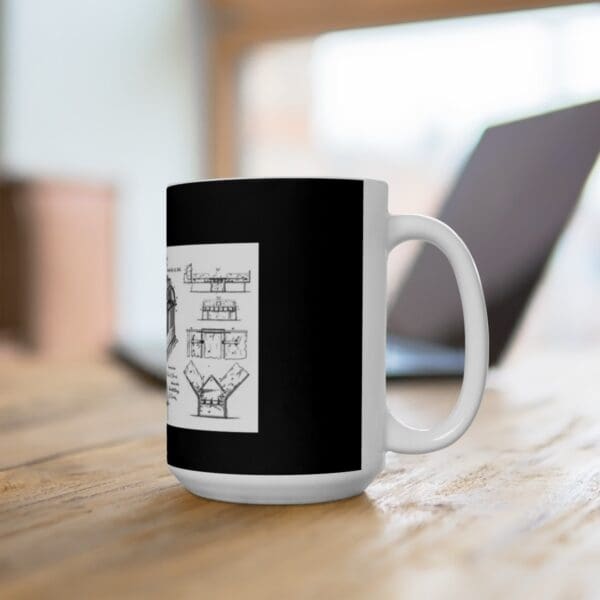 White coffee mug with a black architectural diagram.