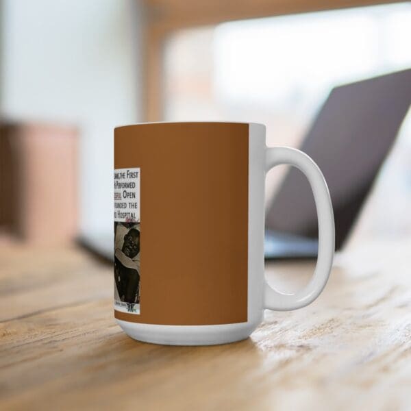 White coffee mug with a brown design.