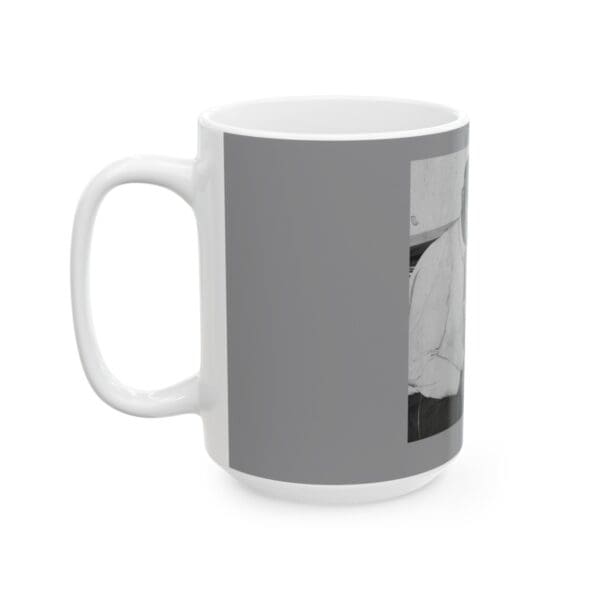 White mug with a black and white photo.