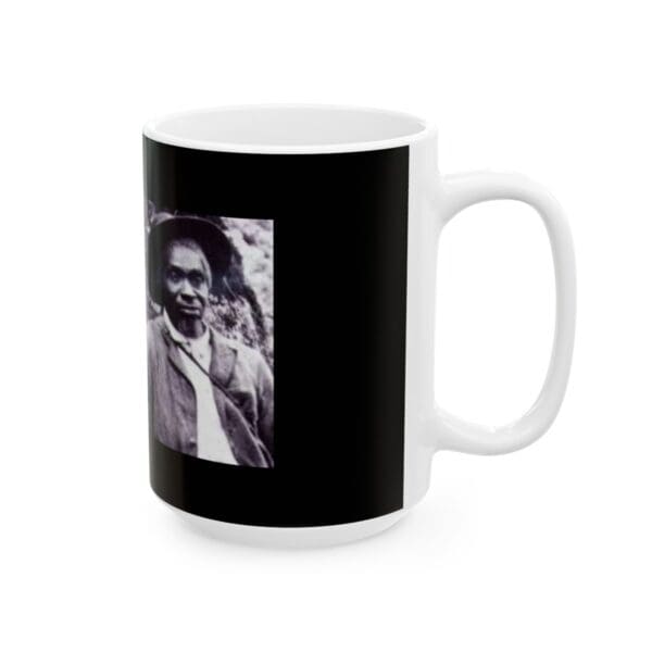 White mug with a black and white image of an older man.