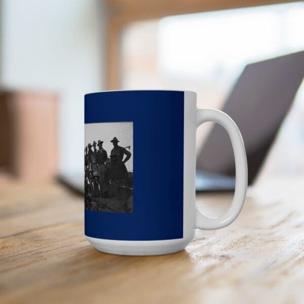 White mug with a navy blue image of soldiers.