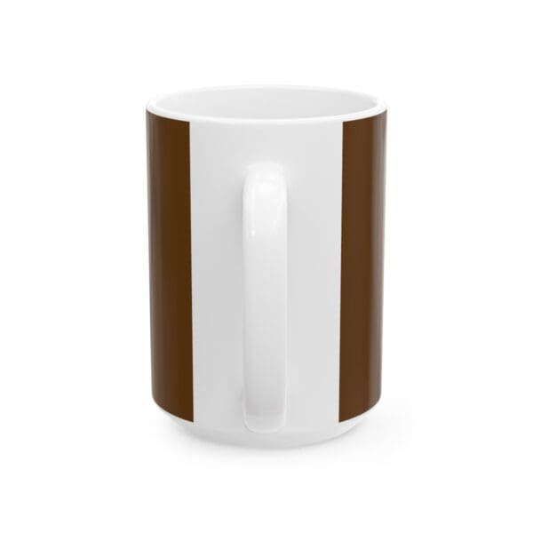 White coffee mug with brown stripes.