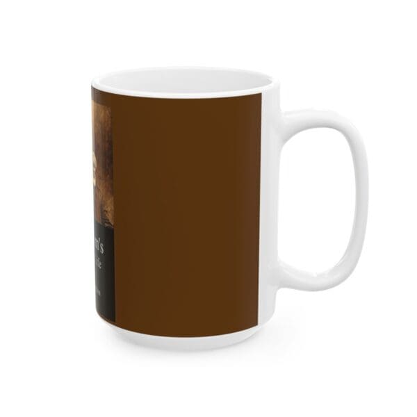 White coffee mug with brown design.