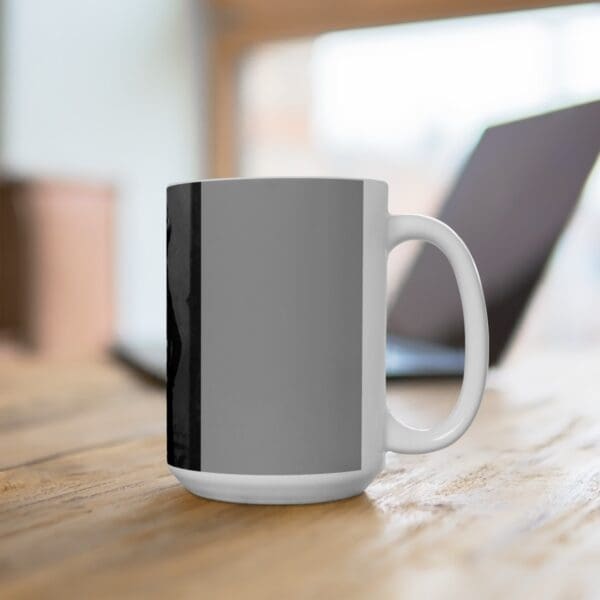 White coffee mug on wooden table.