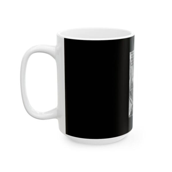 White coffee mug with black design.