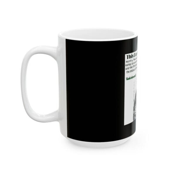 White mug with black and white text and image.