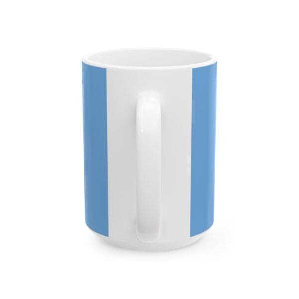 White mug with blue vertical stripes.