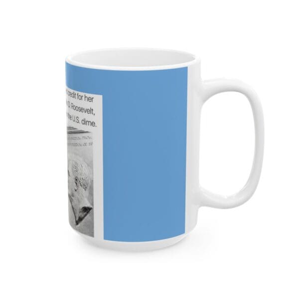 White coffee mug with a blue design.