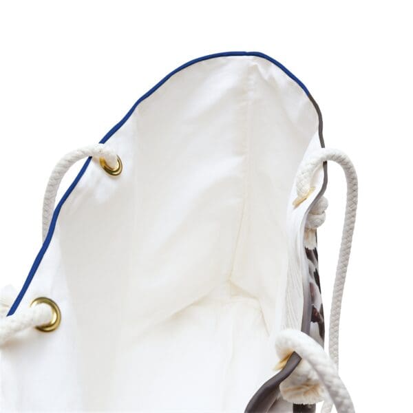 White canvas tote bag with blue trim.