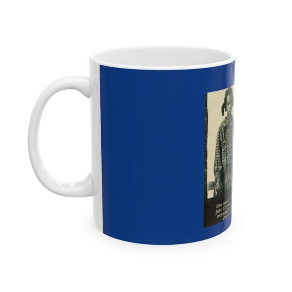 Blue mug with a woman in a photo.