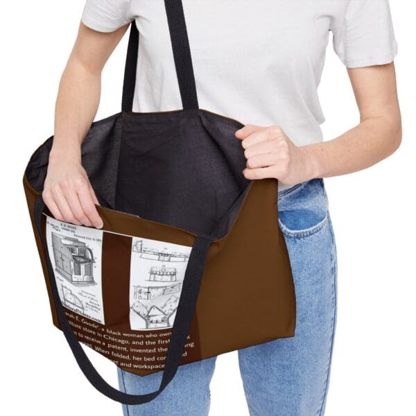 Brown tote bag with Sarah E. Goode invention image.