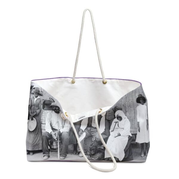 White tote bag with black and white photo of people.