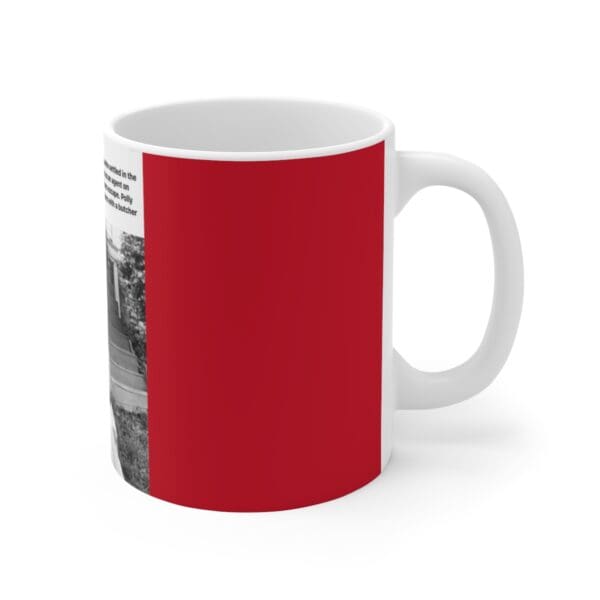 White mug with red background and image.