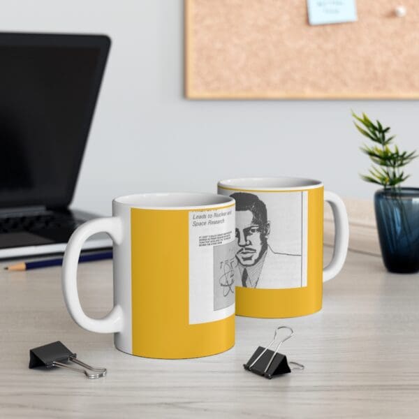 Yellow mug with a man and a nuclear symbol.