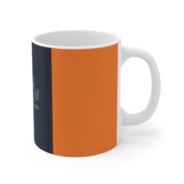 White coffee mug with book cover design.