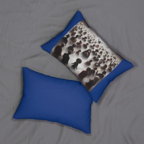 Two pillows, one with a crowd of people.