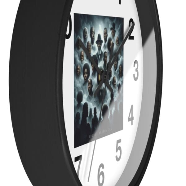 Black clock with a picture of people.