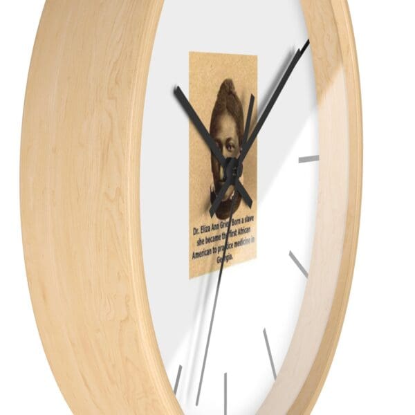 Wooden clock with Dr. Eliza Ann Grier portrait.