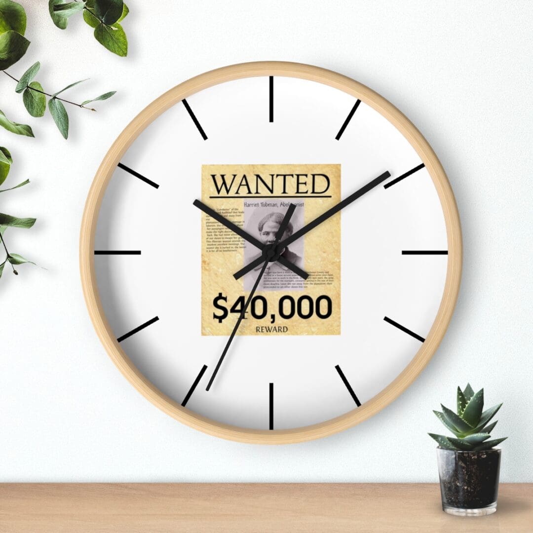 Round clock with a wanted poster of Harriet Tubman.