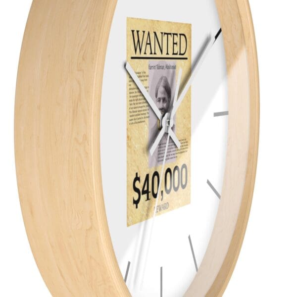 Wooden clock with Harriet Tubman wanted poster.