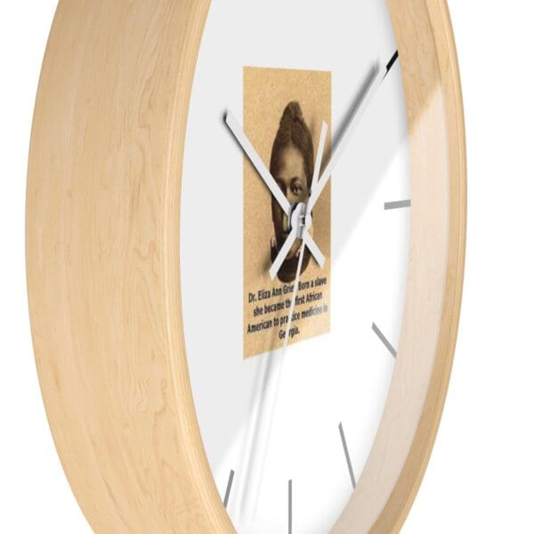 Wooden clock with Dr. Eliza Ann Grier portrait.