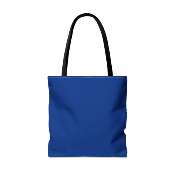 Blue tote bag with black handles.