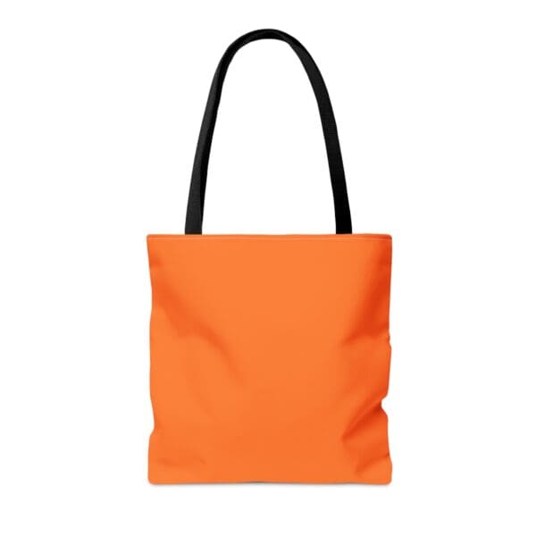 Orange tote bag with black handles.