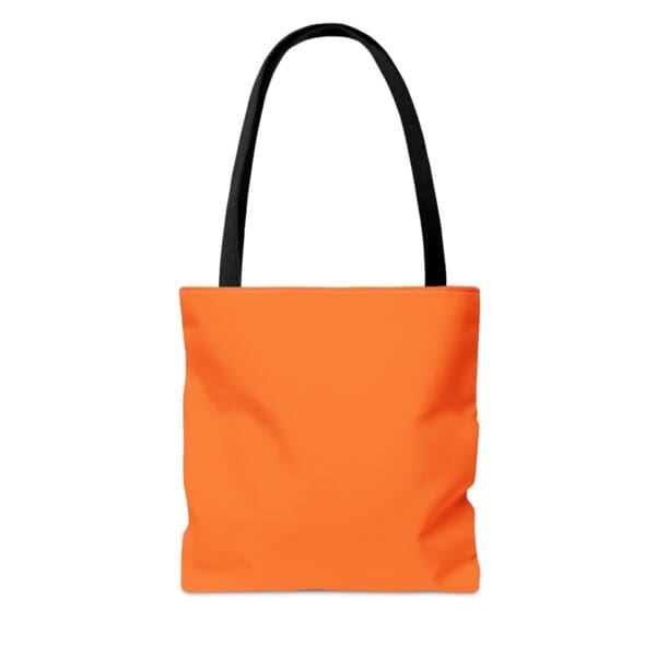 Orange tote bag with black handles.