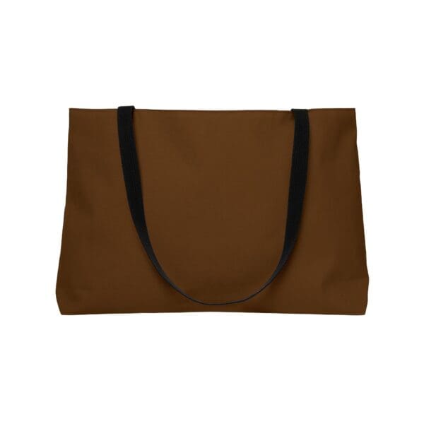 Brown tote bag with black straps.