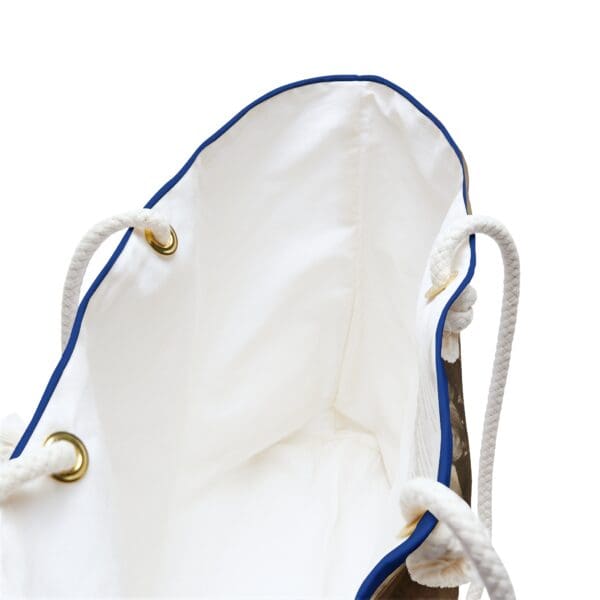 White canvas tote bag with blue trim.