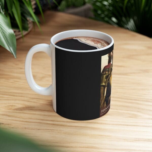 Black coffee mug with Hannibal Lecter image.