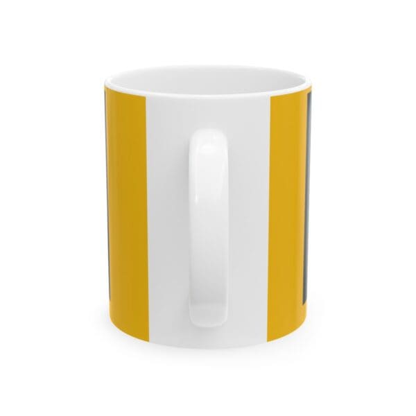 White mug with yellow stripes.