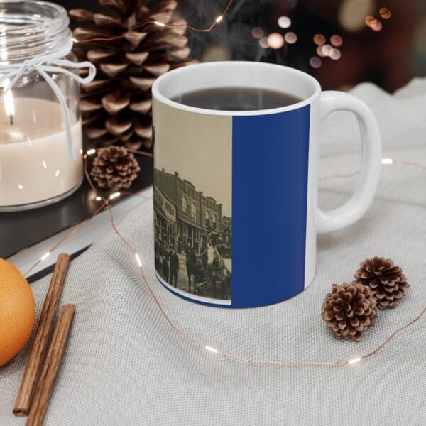 Blue mug with vintage town scene.