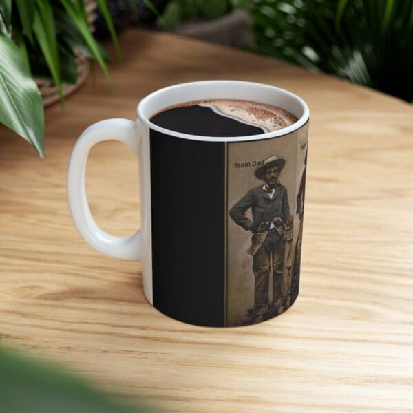 White coffee mug with Isom Dart image.