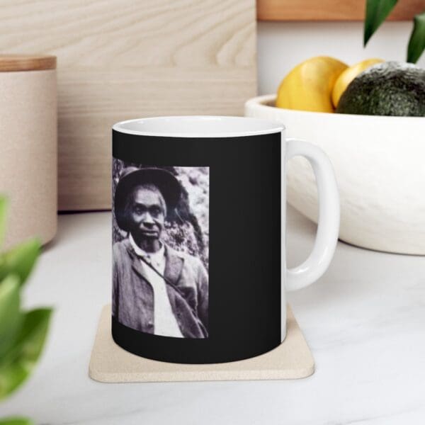 Black and white mug with portrait of a woman.